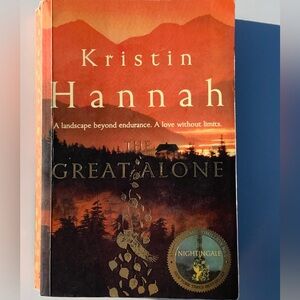 Kristin Hannah's The Great Alone - Orange and Black Cover